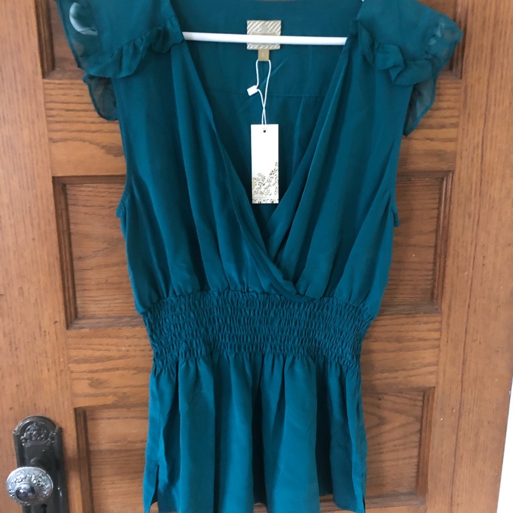 Faux wrap smocked waist top